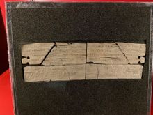 One of the ink tablets.  i won't attempt to describe the process of retrieving the letters.  This on was an invitation to a party and its says, "Please don't bring your famous deviled eggs, they give Claudius gas."