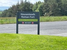 Parking lot at Homesteads. Not quite full but more than a few cars and some coaches