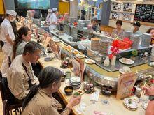 We waited a few minutes and were seated at the counter