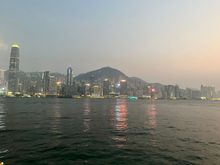 View of HK Island across Victoria Harbor from West Kowloon at Dusk