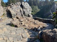 There is a series of steps made out of rock that leads up to the top of Wedding Rock