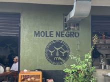 This is the back side of Mole Negro.  Usually a line and this is the view from the chairs they have in the back for waiting customers.  This year they have a little pastry station, so you can a little something before breakfast.  Always thinking these Mexicans.