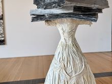 One room was devoted to wedding dresses. He replaced all the heads of the women, who were all well known in their day, with items representing them and their story. This is depicting a women on Lesbos and her love of learning and poetry about her sexuality. Those "book" weigh a ton, literally!