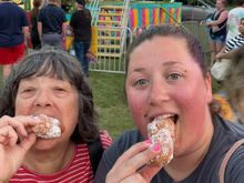 Eating zeppolis at a carnival is our favorite part