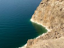Samir pointed out where the salt forms along the edge of the coast 