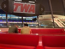 The Arrivals/Departures sign continually rotates through flights to exotic places, cute sayings, and TWA ads