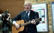 This photo tells you a lot about Boris.  (For non-guitarists, the capo [that bar] goes below the hand, not in front of it.)
