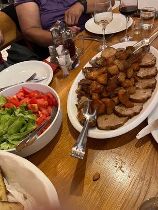 Salad, veal,  and potatoes 
And of course Apple strudel for dessert
Lots of wine and a good time was had by all