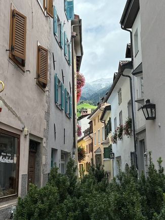 You can see the snow on the mountains above the city