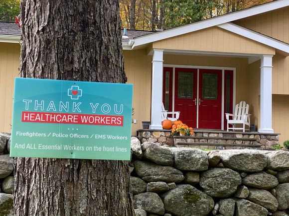 
A nice sign to go with a cozy porch. 