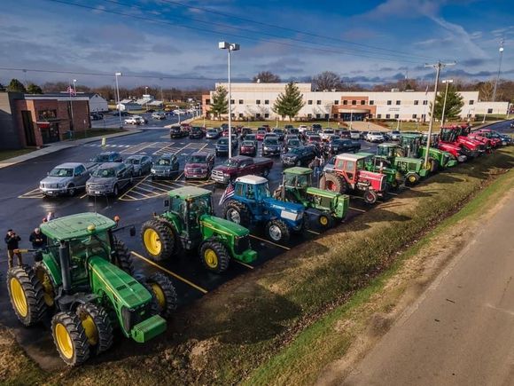This isn’t my photo but it is my town and it shows the glory of Tractor Day.  The picture is screaming Midwest farm town!!! 