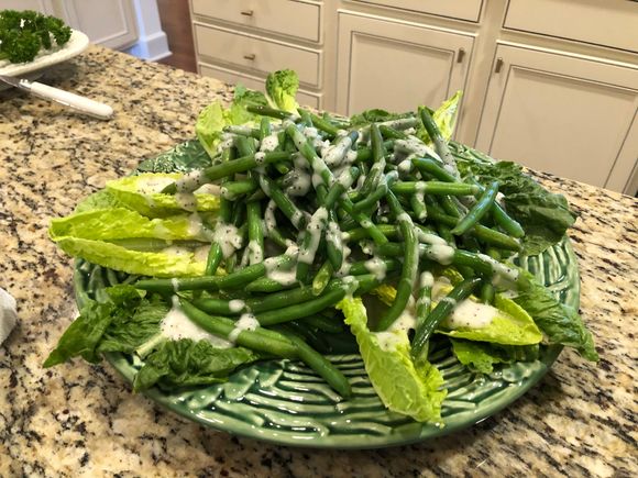 
Green beans on romaine with poppy seed dressing