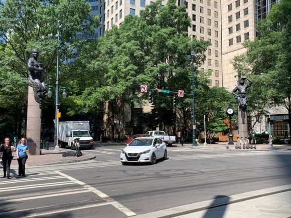 Statues at four corners of Tryon & Trade; unique city sculptures!