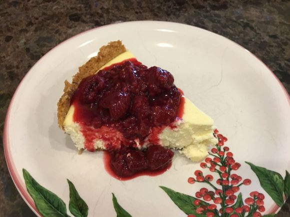 Lemon and lemon zest with raspberries cooked in limoncello