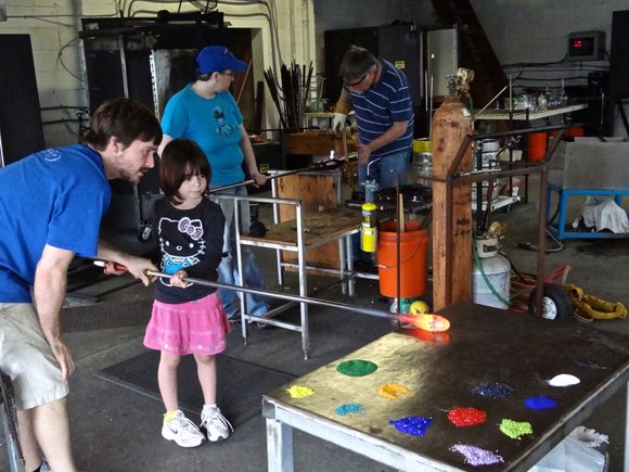 GD adding color to milton glass supervised by Tim, her instructor