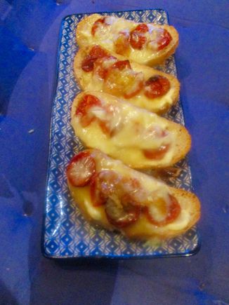 Toasts with tomatoes, cabécou, and honey