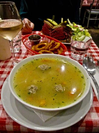 OMG, we finally got our pastrami sandwich and matzoh ball soup and onion rings at Schwartz's Deli. Holy Grail realized.