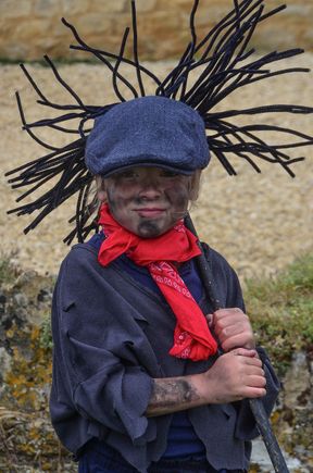 This 'chimney sweep' child and their sibling below put a great deal of effort into their costumes.