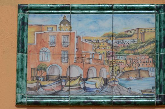 Hand-painted tiles depict the lovely little enclave of Corricella. Another 'painters paradise'.