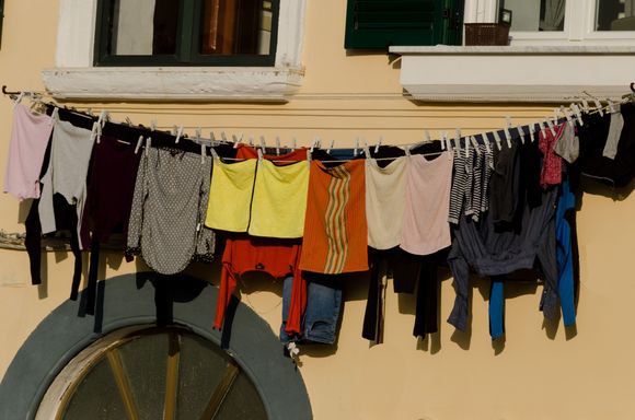 Everyday life across the island included the ubiquitous laundry hung to dry and also...