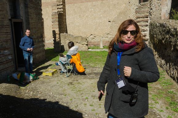 At the House of Argus:
Paola Potenza from the Ministry of Culture had heard about my WC mishap (getting stuck inside then having to climb out through the window). 
"Bienvenuti Senor Zebec, are you OK? We understand that you exited that WC through the window into a group of arriving students. You must be so 'stanco' now, no? My associate here has kindly offered to lead you around by the arm if necessary. Mkay?"