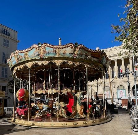 The carousel isn't really part of the holiday festivities, but it is right in the middle of the Christmas market, and right outside of our apartment