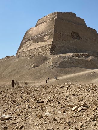 Meidum pyramid with people in front
