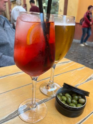 An Aperol spritz with vermouth in place of Aperol.  