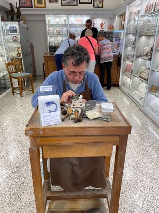 This guy making cameo jewely by hand, my friends in the background buying some. Sorrento. 