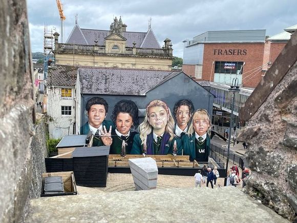 The popular Derry Girls mural, from the wall