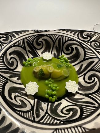 Those incredible, sweet, crunchy and altogether unforgettable tear peas, and a "macerated," and oh, so delicious oyster along with pressed sheep curd (the three white cookie-like things), atop a "gelee" of spinach that was like a cold soup but richer....and BETTER!!!