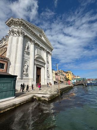 Along the sparkling blue Giudecca Canal