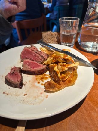 Out of order, but this is the veal that my partner chose as main course; tasty enough but the texture was not as tender as we are used to in the USA.   (Partner does not eat shellfish so he eliminated most of the treasures, both here and at the other restaurants we samples during our week in Galicia)