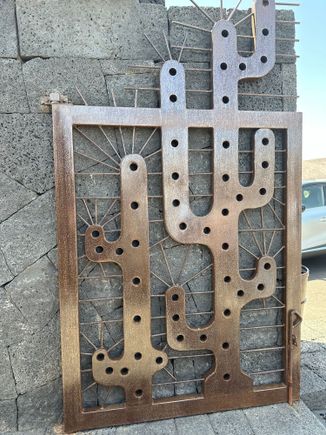 Entrance to cactus garden with metal sculpture designed by Manrique.