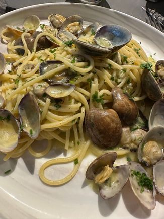 HUGE portion of spaghetti with Vongole (clams); they do not offer half portions here