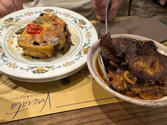 VUCIATA KITCHEN MARKET:  Eggplant a la Siciliana at left and Caponata at right....