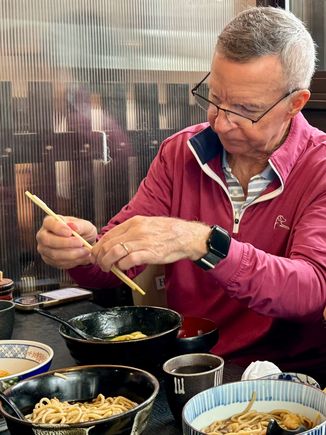 My brother trying to figure out chopsticks 