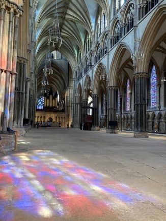 Lincoln Cathedral interior - the stained glass “reflection” on the floor was beautiful!