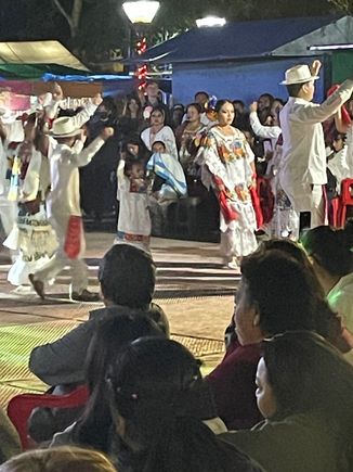 I hope you can see there is a little 3 year old girl dancing away.  Mostly just twirling.  I can't help but think how this will be imprinted on her and how important this is for her culture.