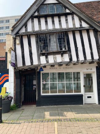 This building has a wonky second story!