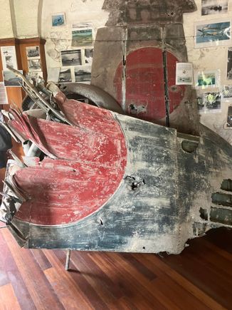 New Guineau Social Club - remnants of Japanese plane inside club (front room)