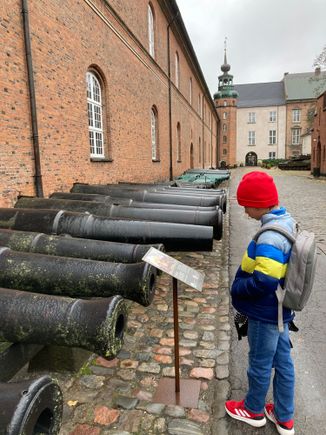My son reading placard outside Danish War Museum
