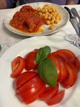 Platter of fresh tomatoes and Ed's cod with tomato sauce and chick peas