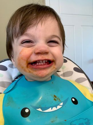 Ethan after enjoying spaghetti and meatballs for dinner!