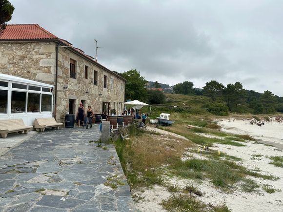 Facade of the restaurant, a former fish salting factory, has two "suns" in the Repsol Guide to Iberian gastronomy (as does D'Berto, where we had two dinners in O"Grove last week)