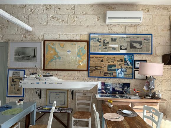 Model of the yacht, captained by Cesare Fiore, which still holds the record of the fastest crossing of the Atlantic, from NYC to England, in 58 hours-plus; Richard Branson held the previous record