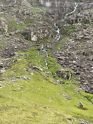 Long waterfall cascading down the mountain