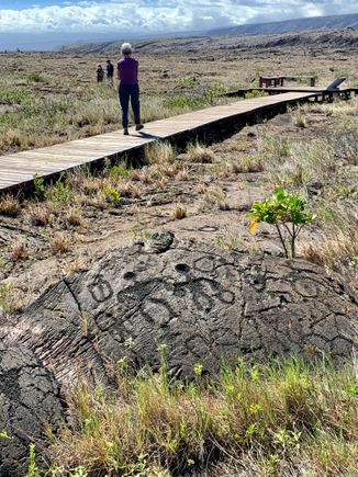 The petroglyphs were in a wide area but they now have a boardwalk for you to walk around a representative sample. Most were not depictions of animals or humans. This was the best example of human drawings. They all date from the 1300s or so.