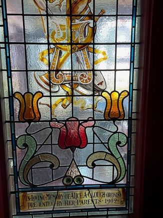 A memorial glass panel for a lost daughter