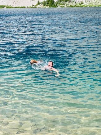 Nate and Molly swimming at the mountain lake. 